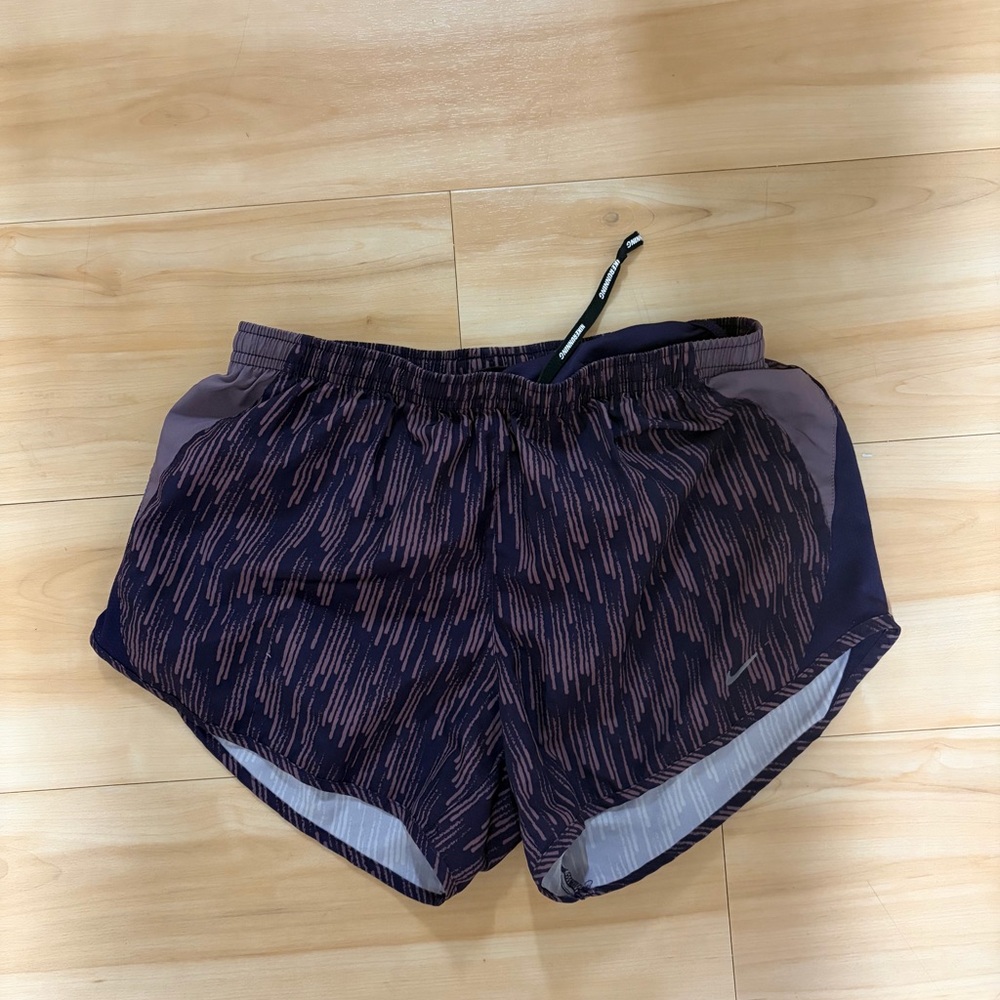 Nike Women's Black and Purple Patterned Athletic Shorts